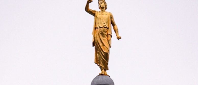 A Natural Mystic Blowing Through the Air Angel Moroni from atop the Church of Jesus Christ of Latter-day Saints